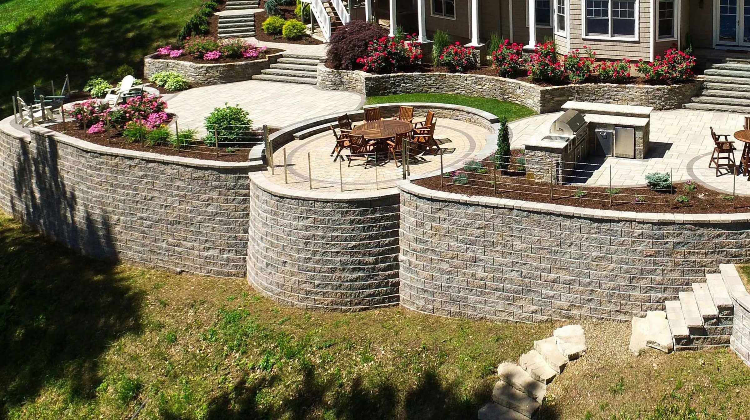 image of huge retaining wall in backyard