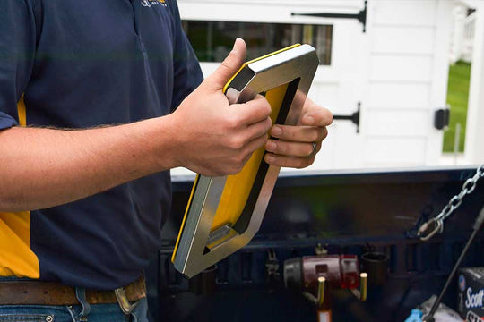 person putting a pad cover on a suction pad