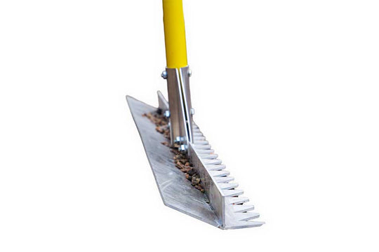 rake tool with a yellow handle and white bristle brush on a white background