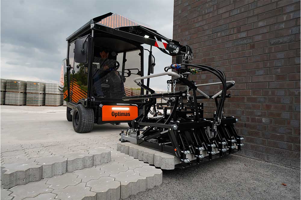 An orange and black S24 PaveJet paver laying machine