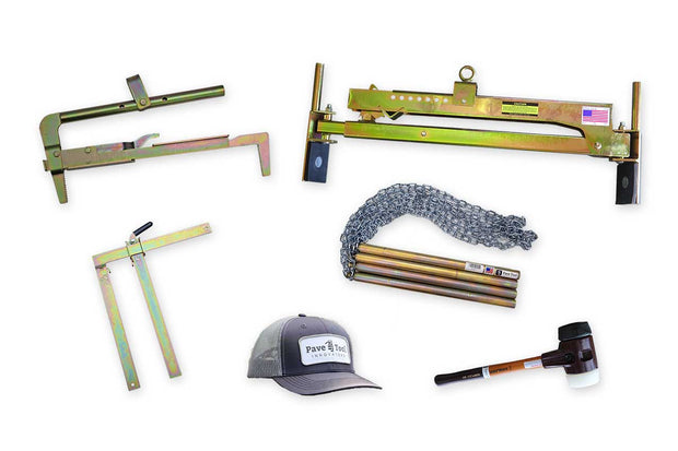 Collection of tools including a hat, mallet, and block clamps on a white background